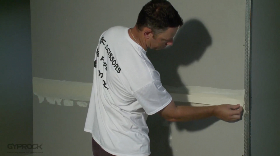 Gyprock professional installer setting a joint