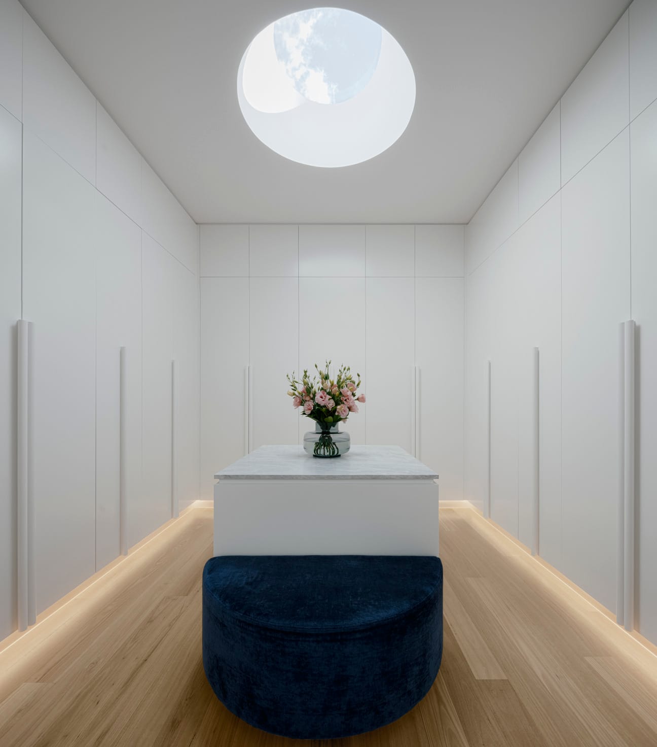 dressing room with round skylight