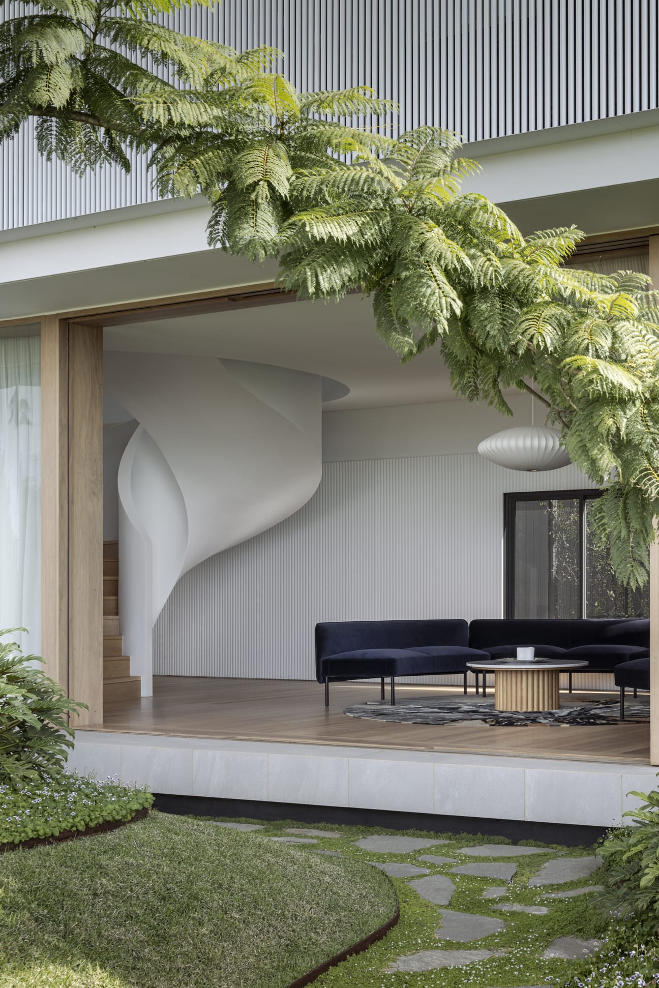 external view of garden and spiral staircase